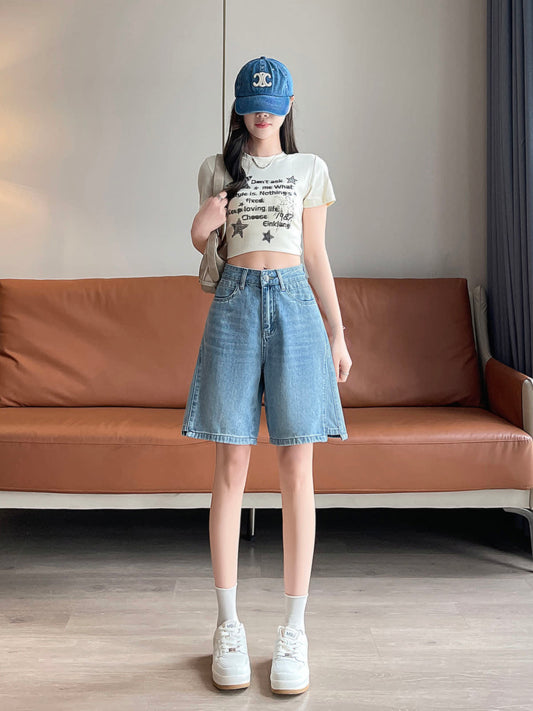 YEEYEEWang Denim Bermuda Shorts in Blue, Asian-fit cut, full-body front standing pose with a shoulder bag slung over one shoulder, styled with denim cap and white sneakers.