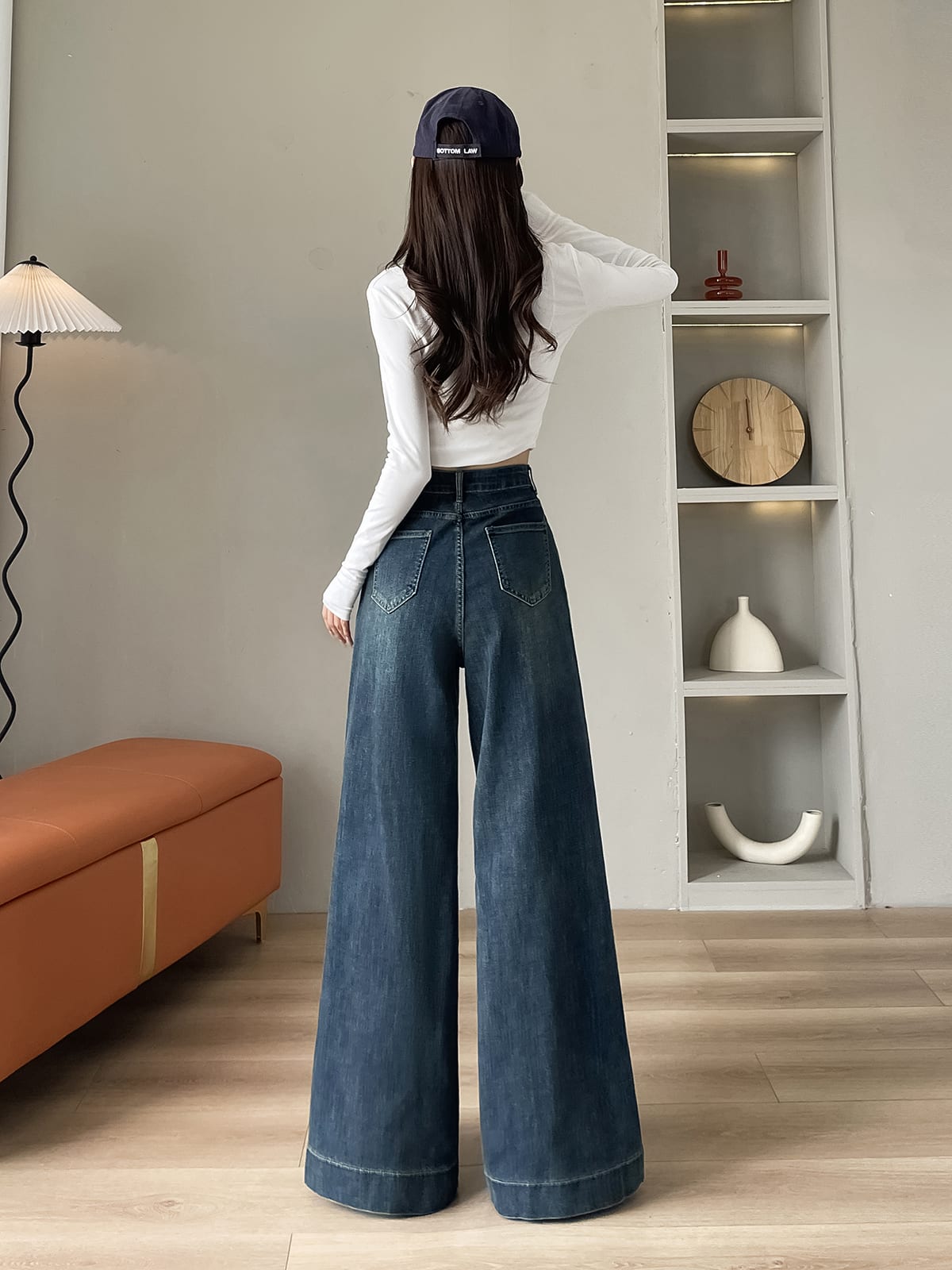 YEEYEEWang wide-leg jeans in mid-wash blue, Asian-fit cut, back lifestyle view on model.