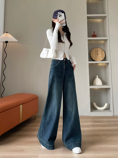 YEEYEEWang wide-leg jeans in mid-wash blue, Asian-fit cut, dynamic pose showing drape.