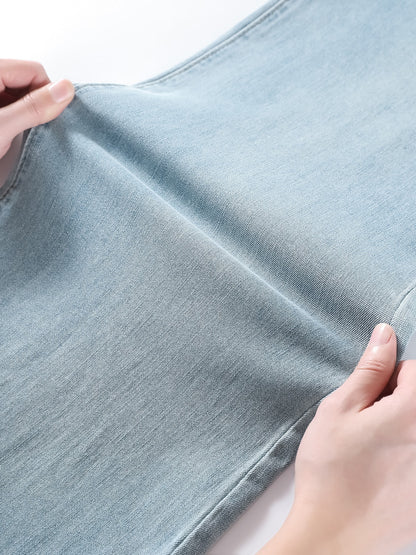 YEEYEEWang wide-leg jeans in light wash blue, Asian-fit cut, close-up of denim fabric texture.