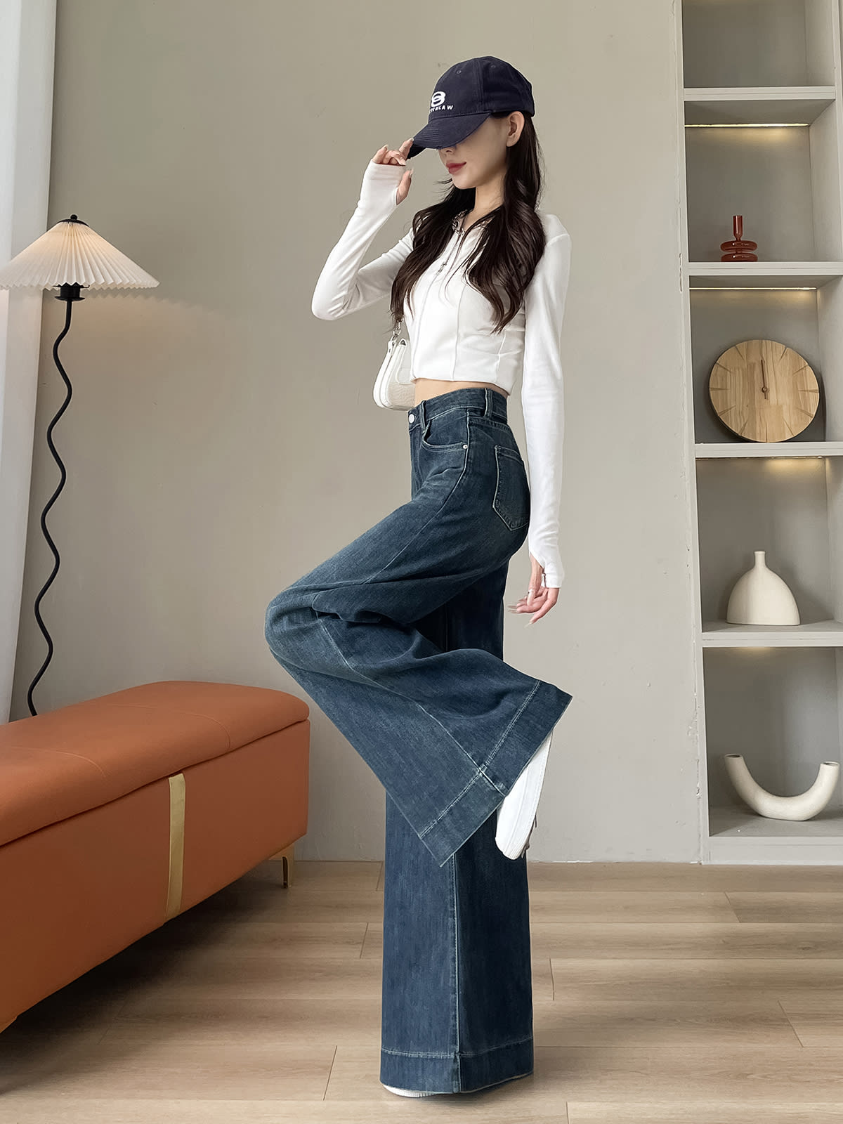 YEEYEEWang fleece-lined wide-leg jeans in mid-wash blue, Asian-fit cut, leg up showing fit.