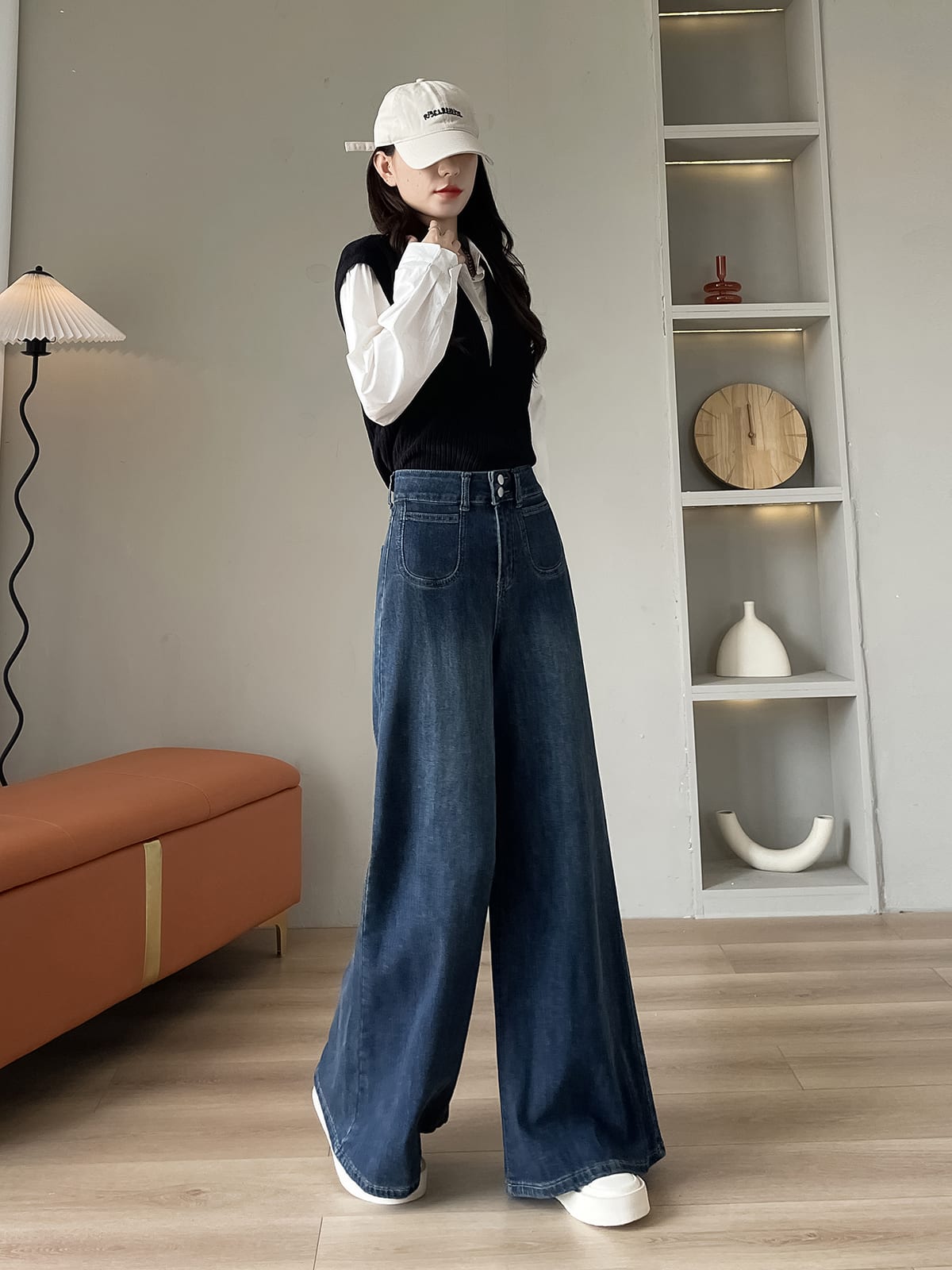 YEEYEEWang wide-leg jeans in vintage blue, Asian-fit cut, dynamic pose showing fluid drape.