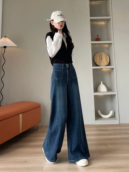 YEEYEEWang wide-leg jeans in vintage blue, Asian-fit cut, dynamic pose showing fluid drape.