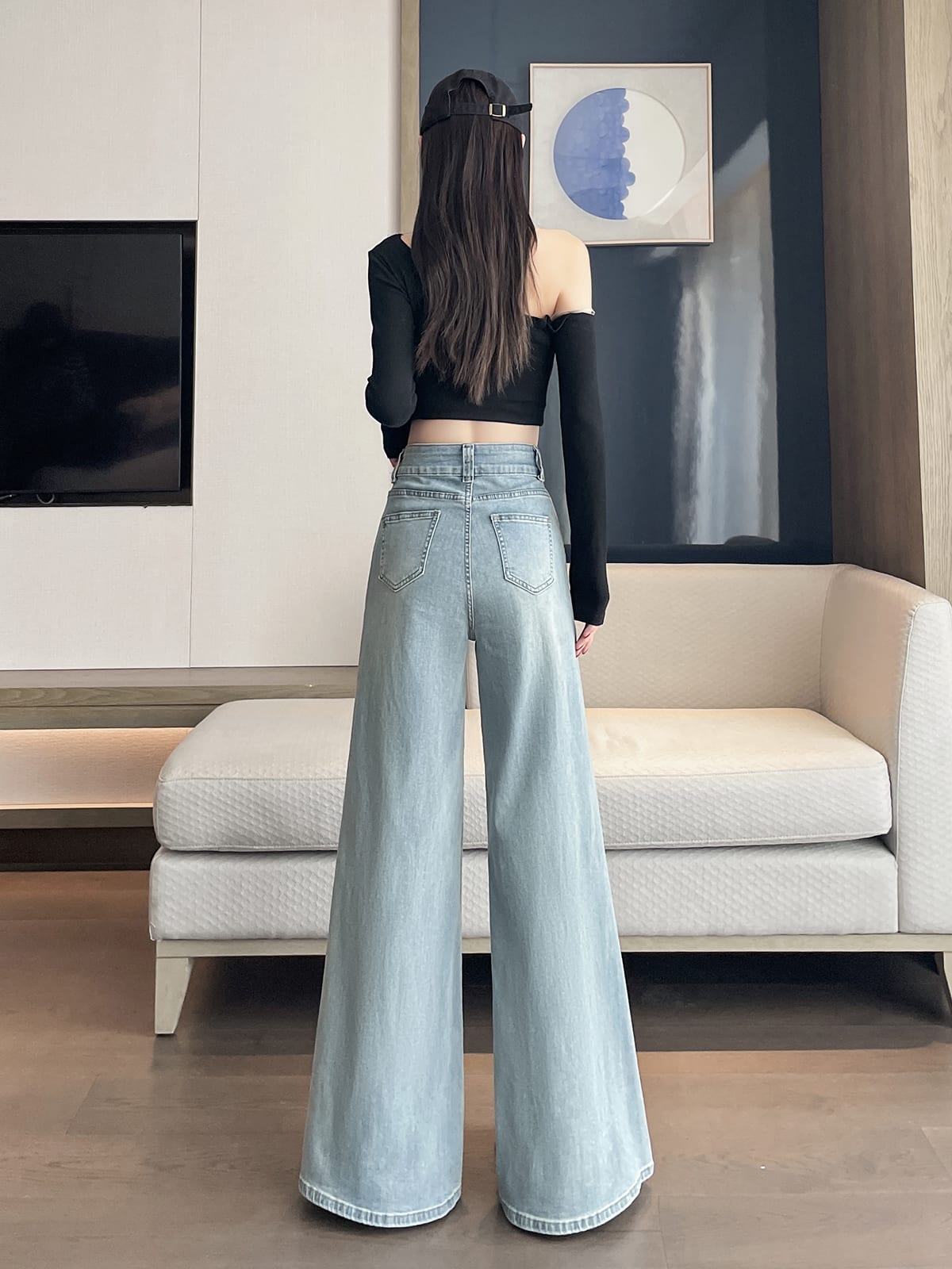 YEEYEEWang wide-leg jeans in light wash blue, Asian-fit cut, back view highlighting pocket placement.