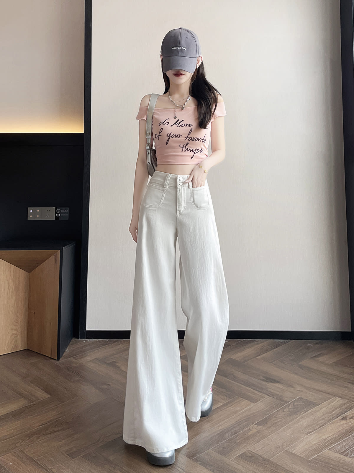 YEEYEEWang wide-leg jeans in white, Asian-fit cut, dynamic pose showing fluid drape.