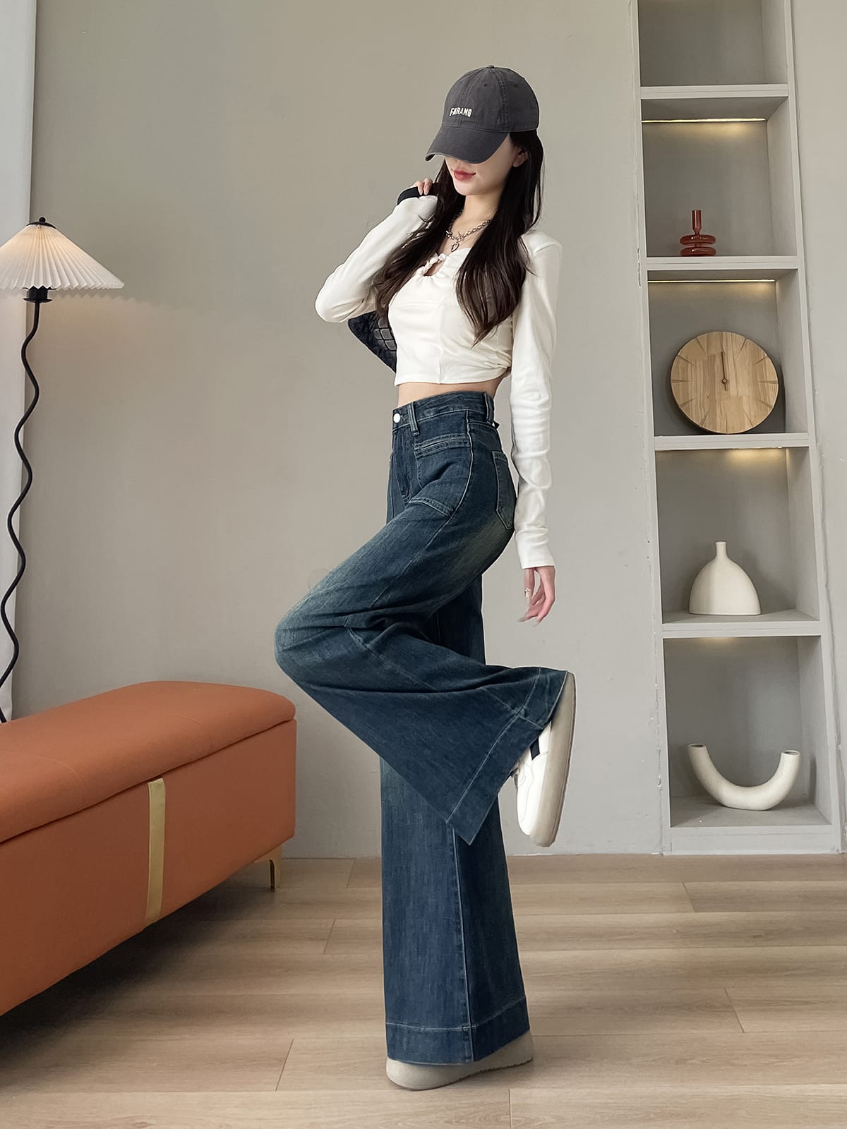 YEEYEEWang wide-leg jeans in mid-wash blue, Asian-fit cut, leg up showing wide fit.