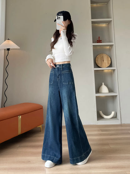 YEEYEEWang wide-leg jeans in vintage blue, Asian-fit cut, dynamic pose showing drape.