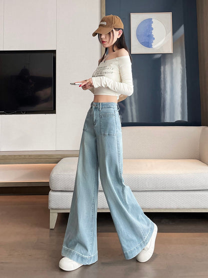 YEEYEEWang wide-leg jeans in light wash blue, Asian-fit cut, dynamic pose showing drape.