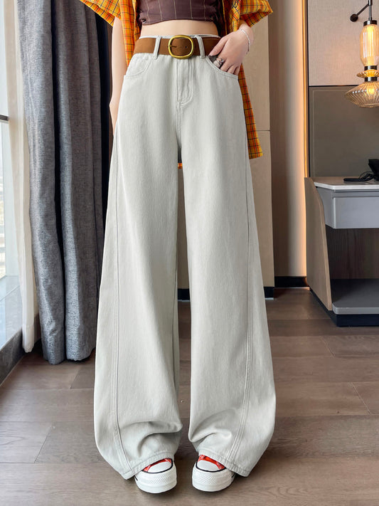 YEEYEEWang Dad Curved Jeans in Taupe Gray, Asian-fit cut, waist-down front standing view showing brown belt with round gold buckle, plaid shirt and crop top visible, variant thumbnail.