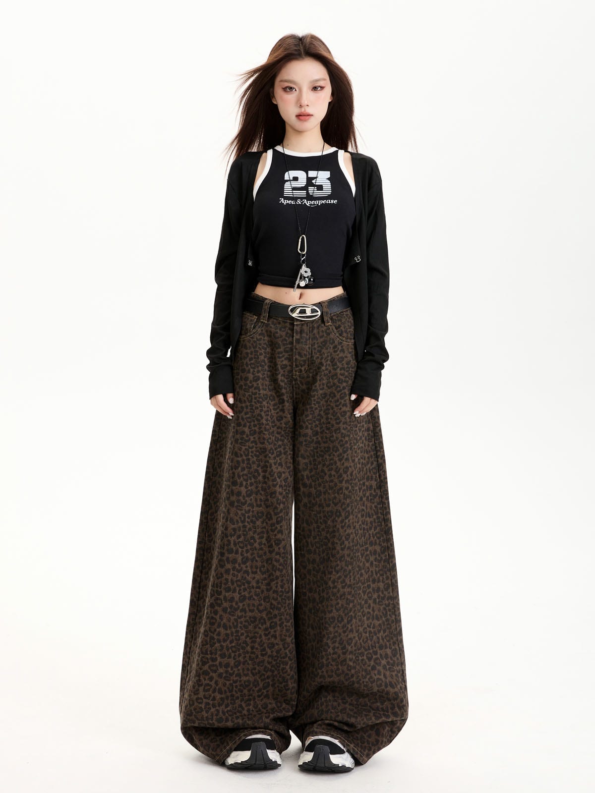 YEEYEEWang Wide-Leg Jeans in Leopard Print, Asian-fit cut, full-body front view standing in a black cardigan with an oval-buckle belt.