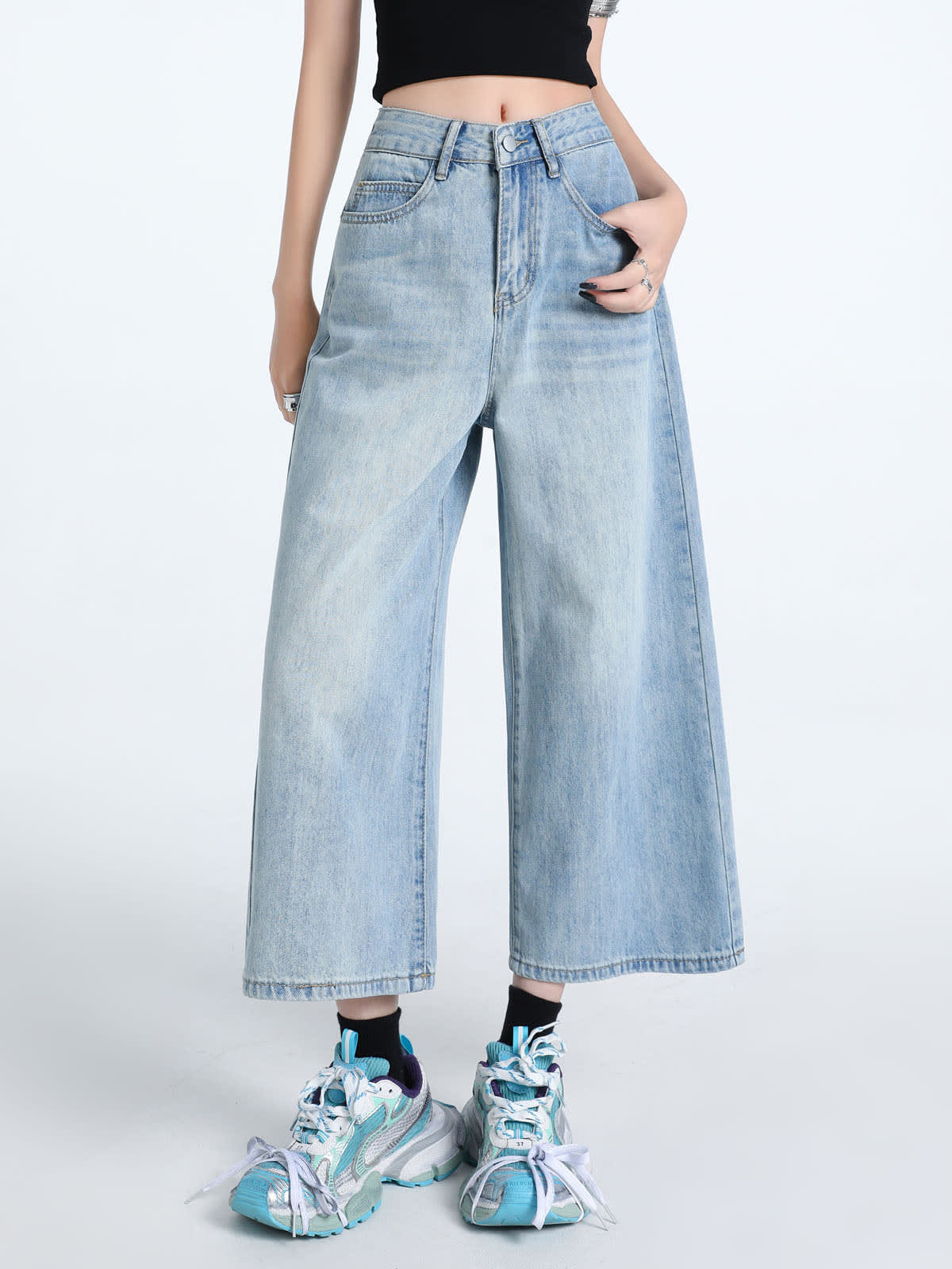 YEEYEEWang Wide-Leg Jeans in Light Blue, Asian-fit cut, waist-down front standing with one hand in front pocket, chunky sneakers, variant thumbnail.