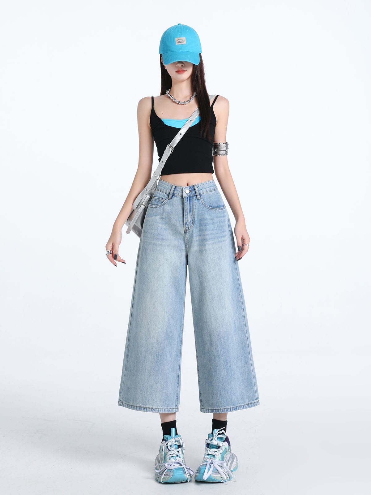 YEEYEEWang Wide-Leg Jeans in Light Blue, Asian-fit cut, full-body front standing pose, blue cap and silver crossbody bag, chunky sneakers.