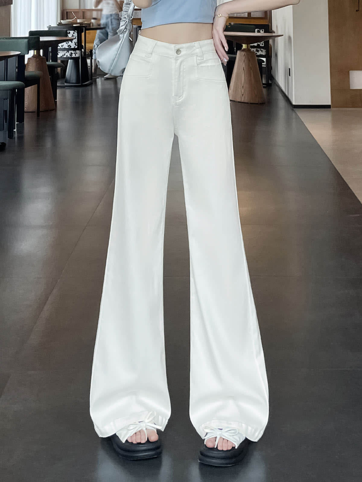 YEEYEEWang Flare Jeans in White, Asian-fit cut, waist-down front view showing high-rise waistband and stacked fluid hems, variant thumbnail.