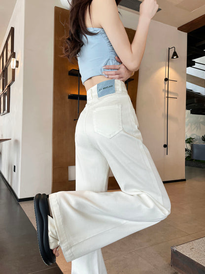 YEEYEEWang Flare Jeans in White, Asian-fit cut, waist-down back view in leg-kick pose showing back patch pocket.