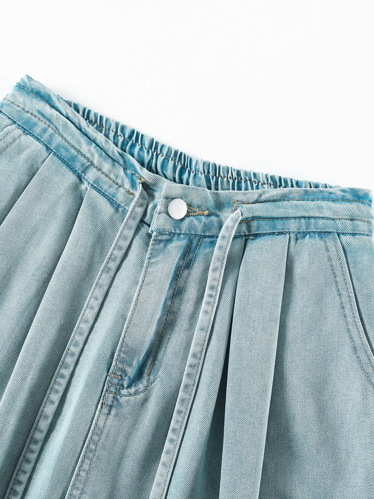 YEEYEEWang Wide-Leg Jeans in Light Blue, Asian-fit cut, close-up of elastic waistband with button, drawstring and pleats detail.