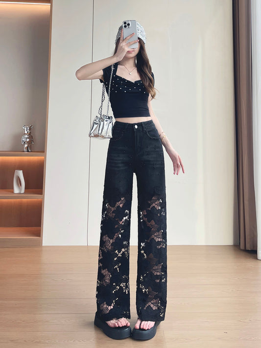 YEEYEEWang Wide-Leg Jeans in Solid Black, Asian-fit cut, full-body front pose holding phone at face, sequin bucket hat and silver chain bag, floral lace cutout legs.