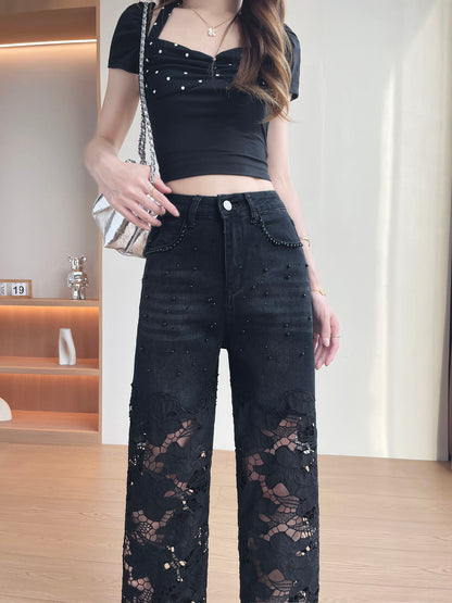 YEEYEEWang Wide-Leg Jeans in Solid Black, Asian-fit cut, close-up front view of high-rise waist with metal button and rhinestone-trim front pockets, studded denim above lace cutout legs.