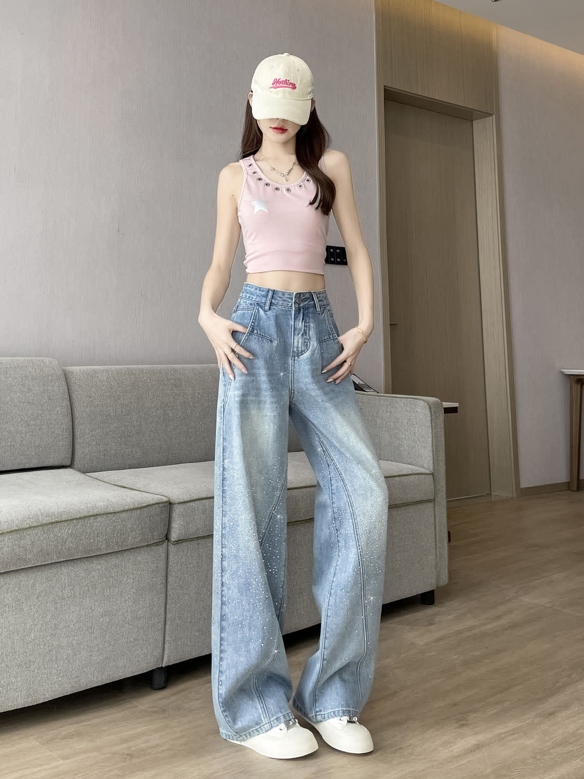 YEEYEEWang Wide-Leg Jeans in Light Blue, Asian-fit cut, full-body standing front pose with hands on hips, pink tank top and cream cap, sparkling wide-leg silhouette.