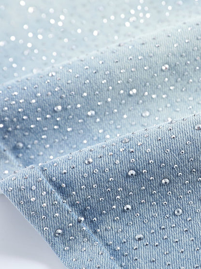 YEEYEEWang Wide-Leg Jeans in Light Blue, Asian-fit cut, close-up of denim texture densely embellished with sparkling rhinestones on twill weave.
