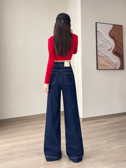 YEEYEEWang Wide-Leg jeans in Denim Blue, Asian-fit cut, full-body back view showing back patch pockets and leather patch, black cap.