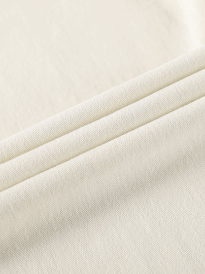 YEEYEEWang Wide-Leg jeans in Ivory, Asian-fit cut, close-up of soft fabric texture with fine twill weave and natural folds.