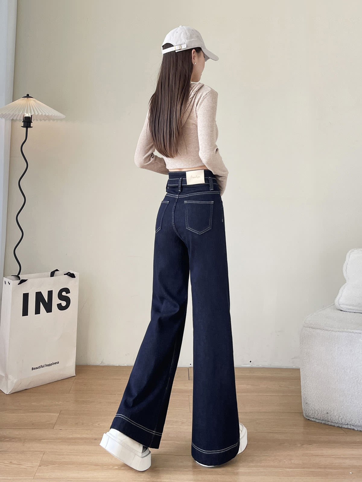 YEEYEEWang Wide-Leg Jeans in Denim Blue, Fleece-Lined, Asian-fit cut, full-body back standing pose showing back patch pockets and contrast stitching.