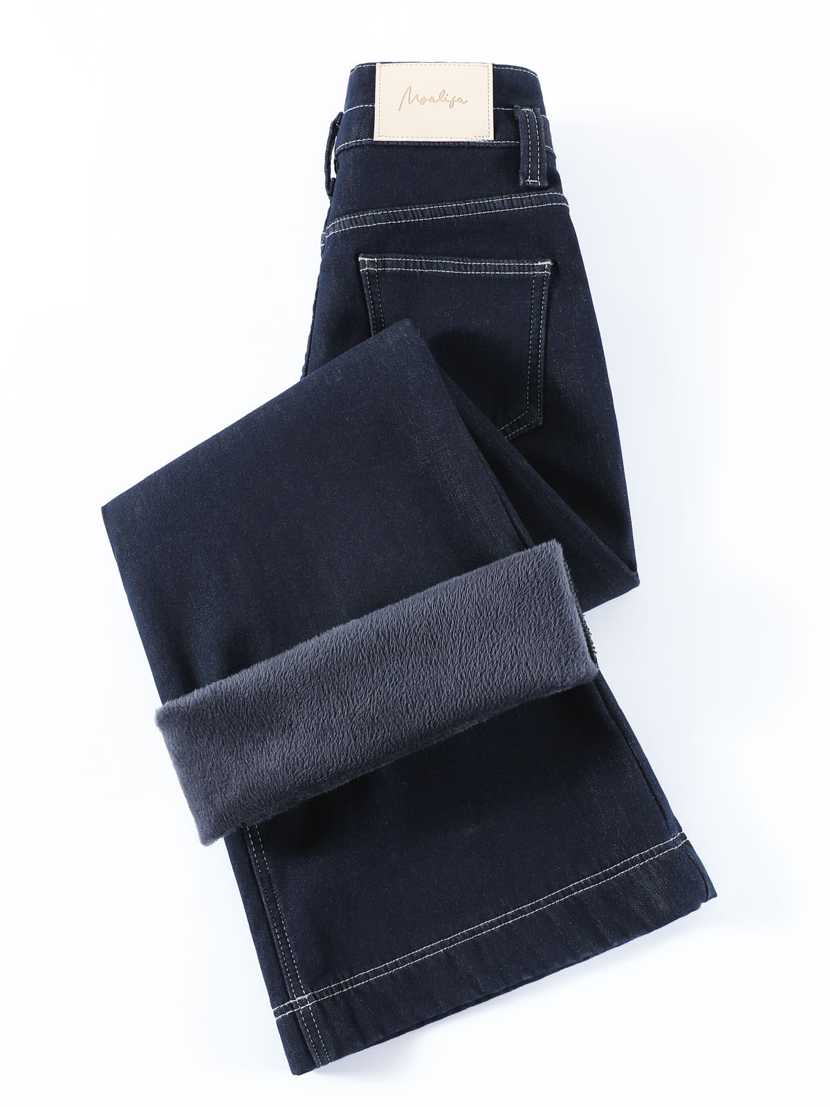 YEEYEEWang Wide-Leg Jeans in Denim Blue, Fleece-Lined, Asian-fit cut, close-up flat lay of folded jeans showing back pocket and rolled hem with fleece lining.