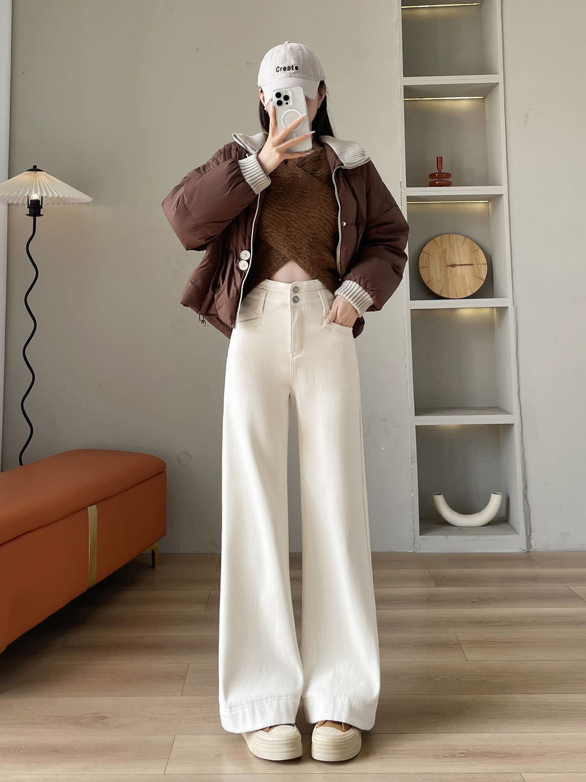 YEEYEEWang Wide-Leg Jeans in Ivory, Fleece-Lined, Asian-fit cut, full-body front standing pose holding phone at face, one hand resting on waistband.
