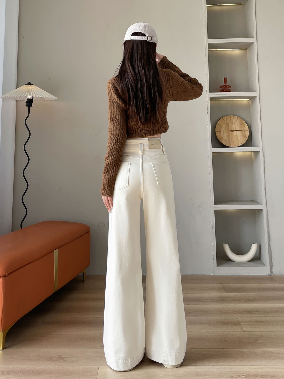 YEEYEEWang Wide-Leg Jeans in Ivory, Fleece-Lined, Asian-fit cut, full-body back standing pose showing back patch pockets and floor-sweeping drape.