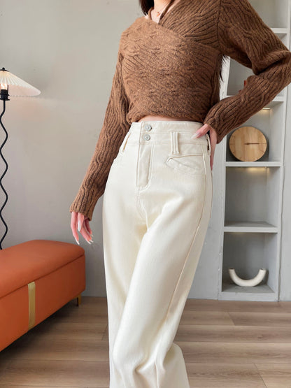 YEEYEEWang Wide-Leg Jeans in Ivory, Fleece-Lined, Asian-fit cut, waist-down front pose with one hand resting on the waistband, silver-tone double buttons on high waistband.