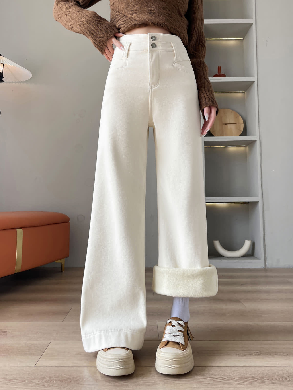 YEEYEEWang Wide-Leg Jeans in Ivory, Fleece-Lined, Asian-fit cut, waist-down front standing pose, one hem rolled up revealing cream fleece lining.