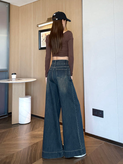 YEEYEEWang wide-leg jeans in Mid-Wash Blue, Asian-fit cut, full-body back view in black cap, back patch pockets and floor-sweeping drape.