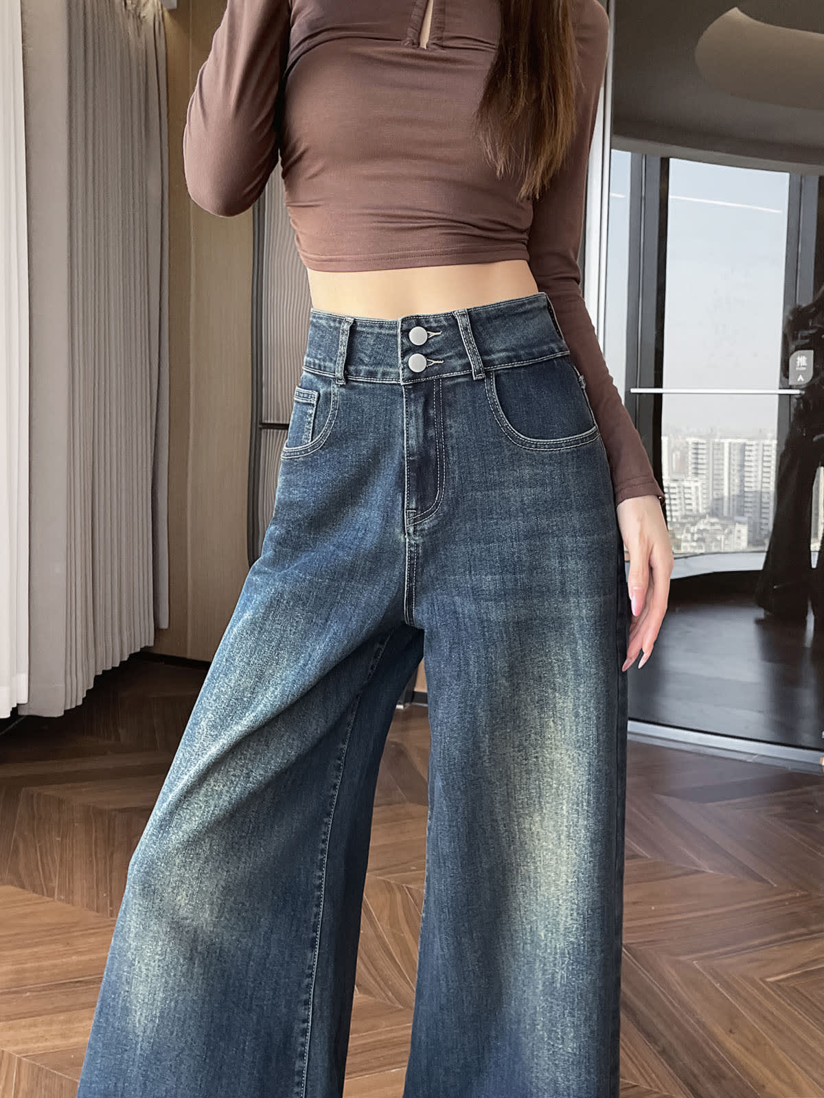 YEEYEEWang wide-leg jeans in Mid-Wash Blue, Asian-fit cut, waist-down walking pose, double-button high waistband and fluid leg drape.