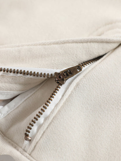 YEEYEEWang wide-leg jeans in Ivory, Asian-fit cut, close-up of metal zipper fly on white tape against soft cream denim.