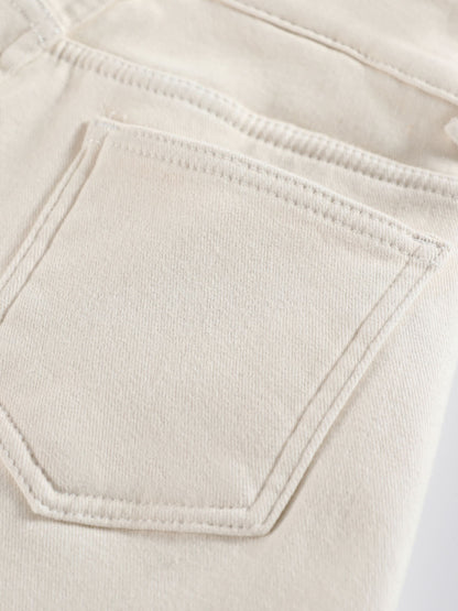 YEEYEEWang wide-leg jeans in Ivory, Asian-fit cut, close-up of back patch pocket with tonal stitching on soft cream denim.