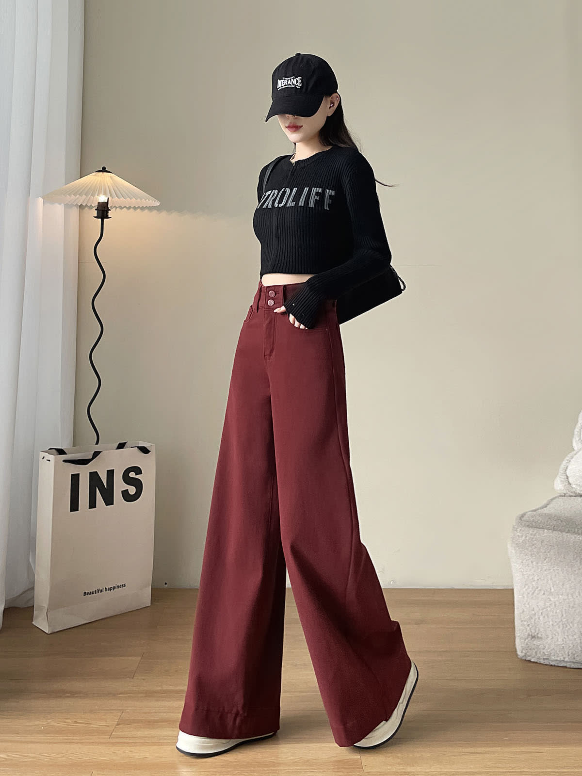 YEEYEEWang wide-leg jeans in Dark Cherry, Asian-fit cut, full-body walking pose in black cap and letter knit top, black shoulder bag.