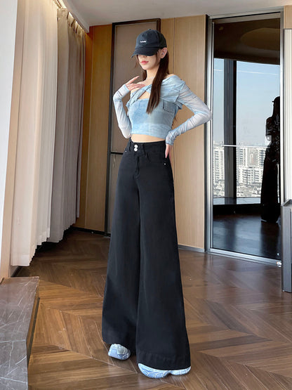YEEYEEWang wide-leg jeans in Solid Black, Asian-fit cut, full-body standing front pose in black cap, one hand touching chest, off-shoulder top.