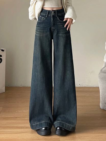 YEEYEEWang Fleece-Lined Wide-Leg Jeans in Mid-Wash Blue, waist-down front standing view with floor-sweeping drape over platform shoes, Asian-fit cut.