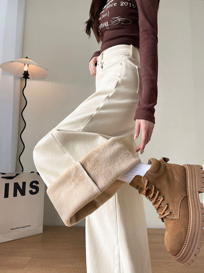 YEEYEEWang Fleece-Lined Wide-Leg Jeans in Ivory, waist-down side view with leg lifted, folded cuff revealing plush fleece lining, Asian-fit cut.