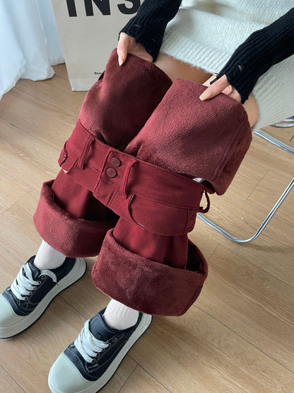 YEEYEEWang Fleece-Lined Wide-Leg Jeans in Dark Cherry, close-up of both hands pressing wine-red plush fleece lining of folded cuffs, Asian-fit cut, variant thumbnail.