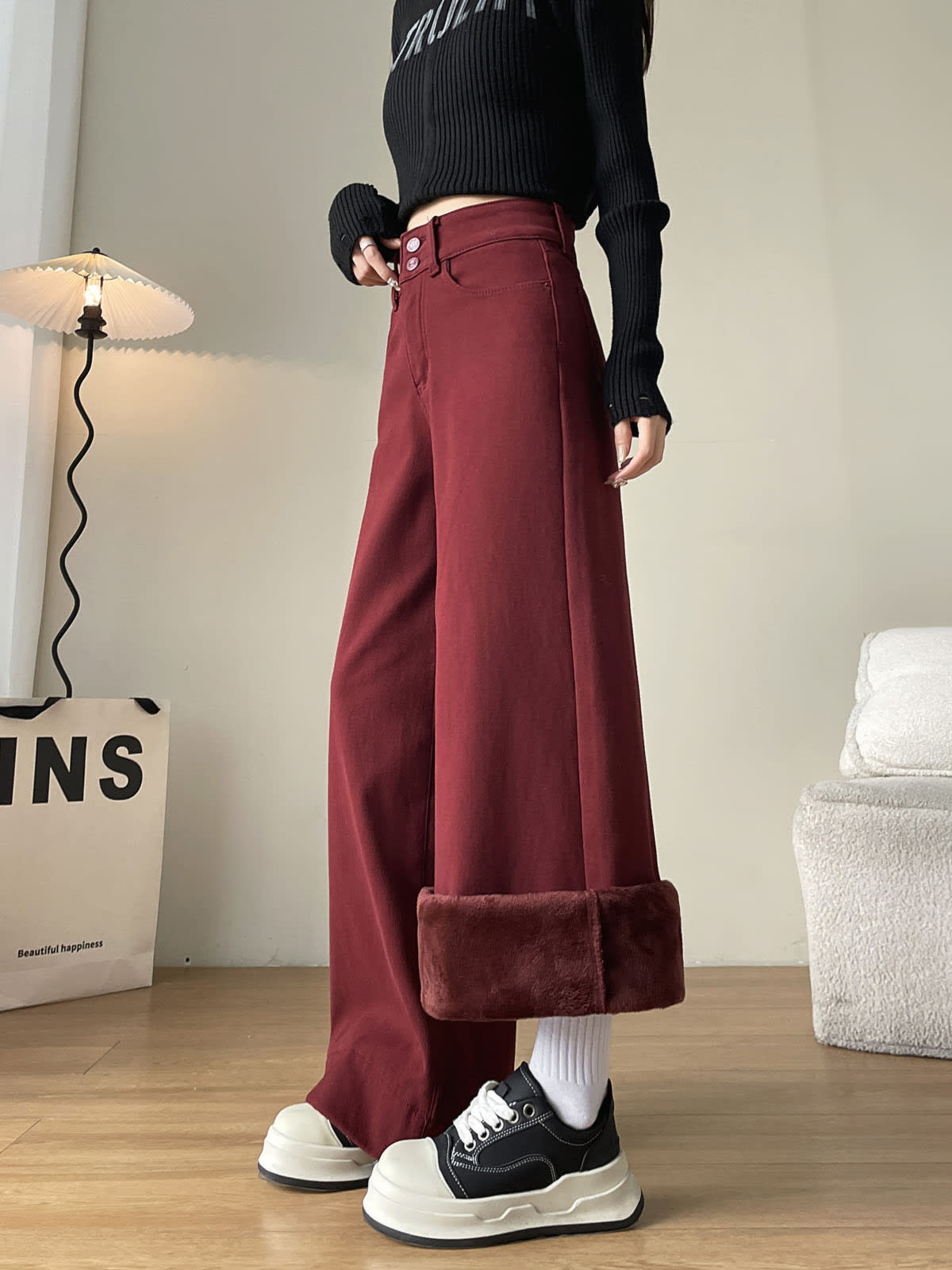 YEEYEEWang Fleece-Lined Wide-Leg Jeans in Dark Cherry, half-body side standing view, one cuff folded up showing wine-red fleece lining, Asian-fit cut.