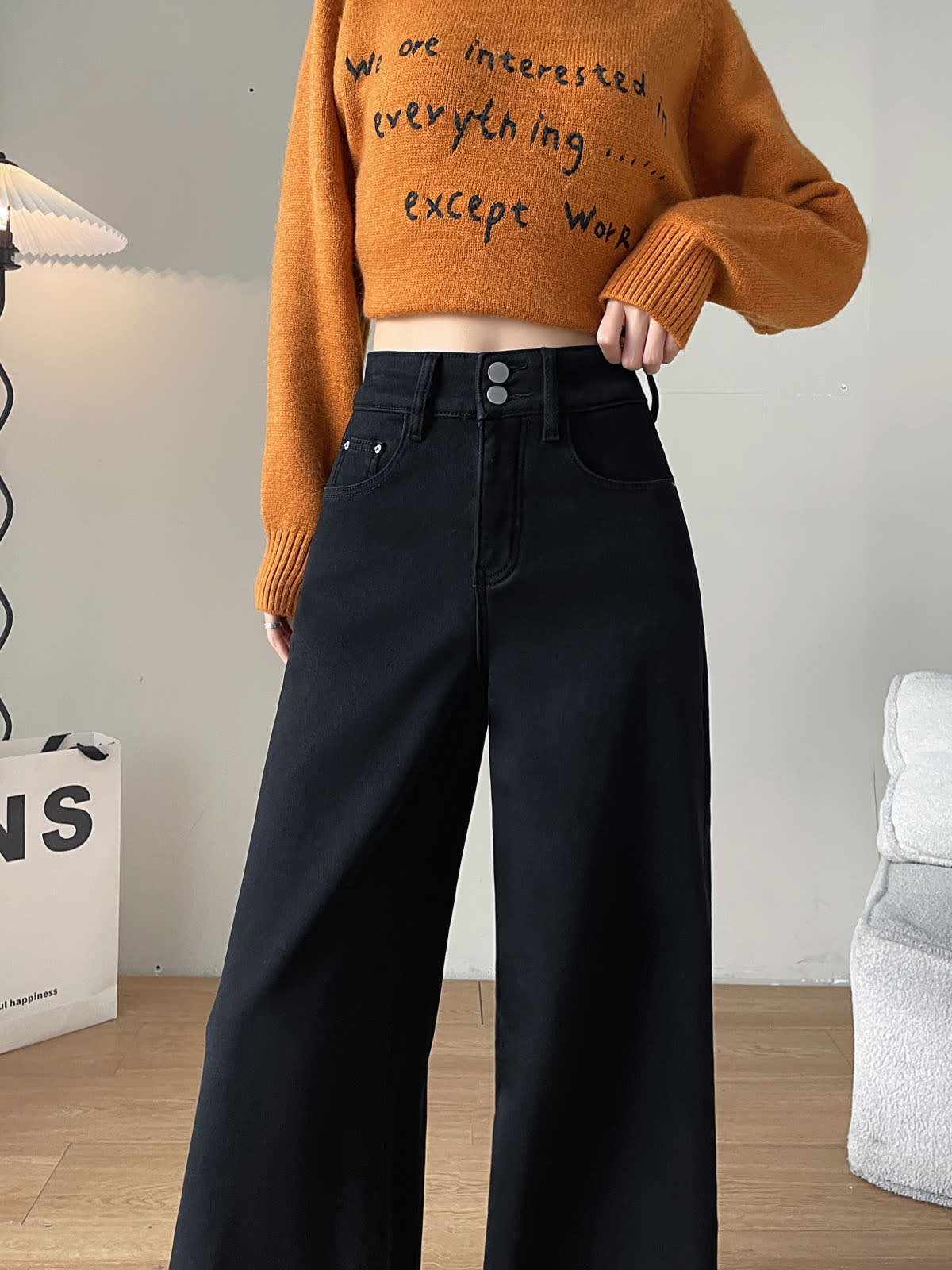 YEEYEEWang Fleece-Lined Wide-Leg Jeans in Solid Black, waist-down front view, double metal buttons and curved front pockets on jet black denim, Asian-fit cut.