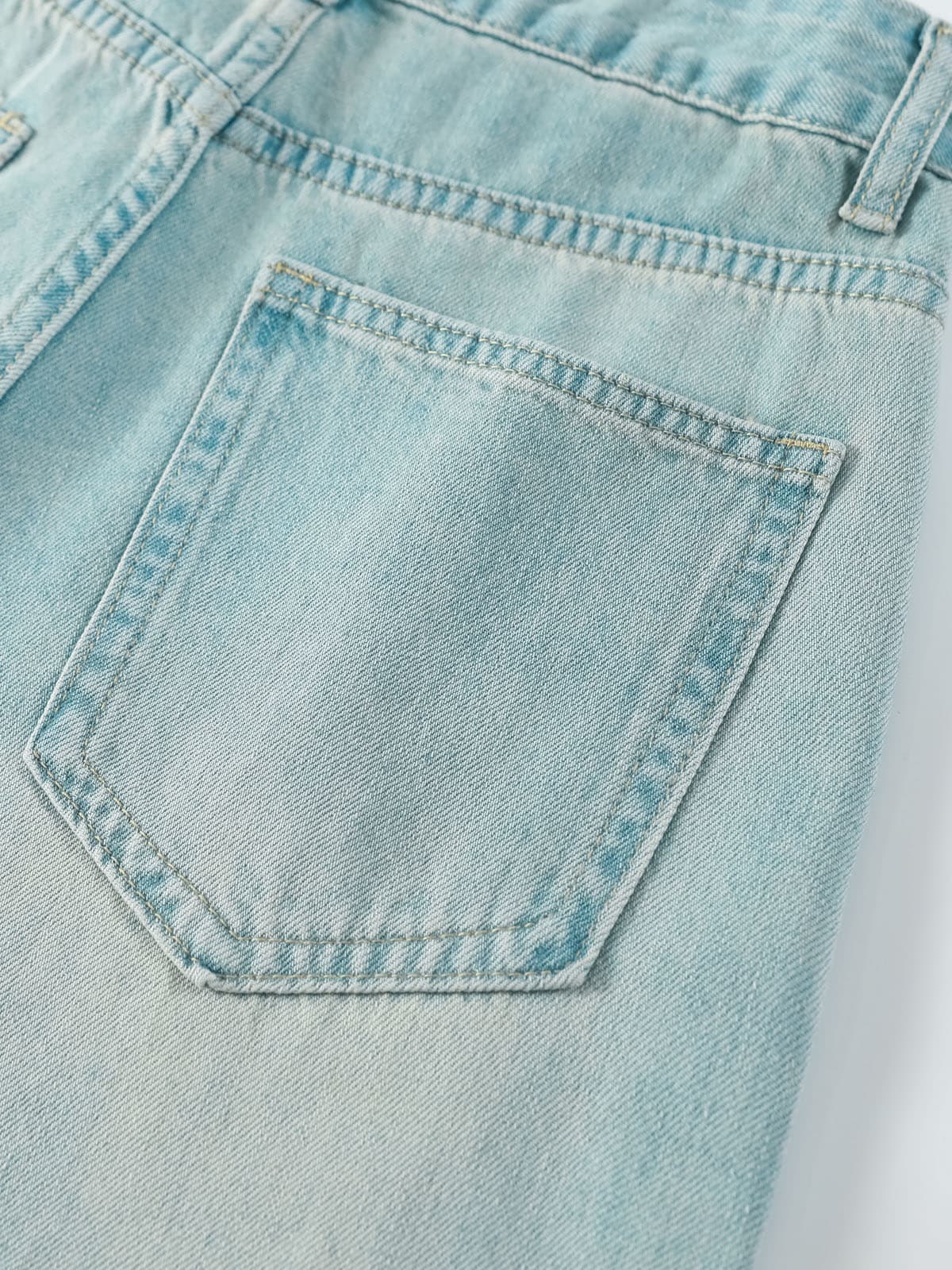 YEEYEEWang Wide-Leg Jeans in Light Blue, Asian-fit cut, close-up of back patch pocket with tonal double stitching on faded denim.