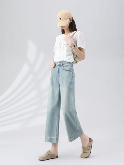 YEEYEEWang Wide-Leg Jeans in Light Blue, Asian-fit cut, full-body side view walking with one hand in front pocket, beige cap and white graphic tee.