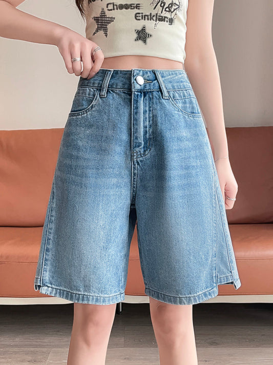 YEEYEEWang Denim Bermuda Shorts in Blue, Asian-fit cut, waist-down front view with hand adjusting the waistband, variant thumbnail.