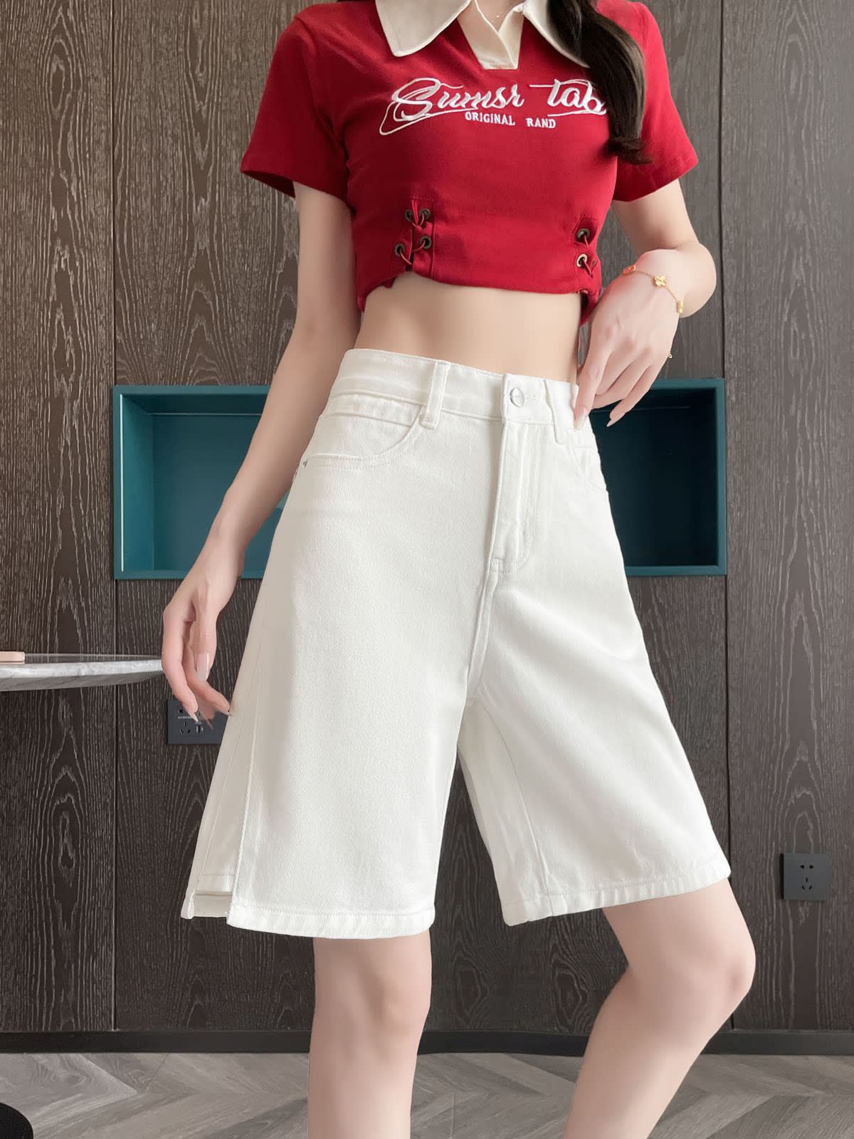 YEEYEEWang Denim Bermuda Shorts in White, Asian-fit cut, waist-down front view with wide-leg drape and clean cuffed hems.