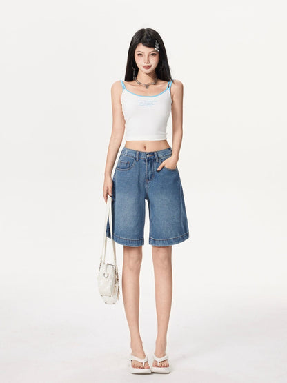 YEEYEEWang Denim Bermuda Shorts in Blue, Asian-fit cut, full-body front standing pose holding a white handbag, paired with white camisole and platform sandals.