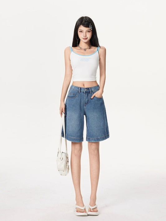 YEEYEEWang Denim Bermuda Shorts in Blue, Asian-fit cut, full-body front standing pose holding a white handbag, paired with white camisole and platform sandals.