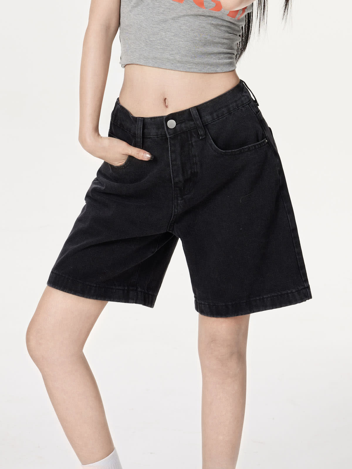 YEEYEEWang Denim Bermuda Shorts in Solid Black, Asian-fit cut, waist-down standing pose with hand in front pocket variant thumbnail.