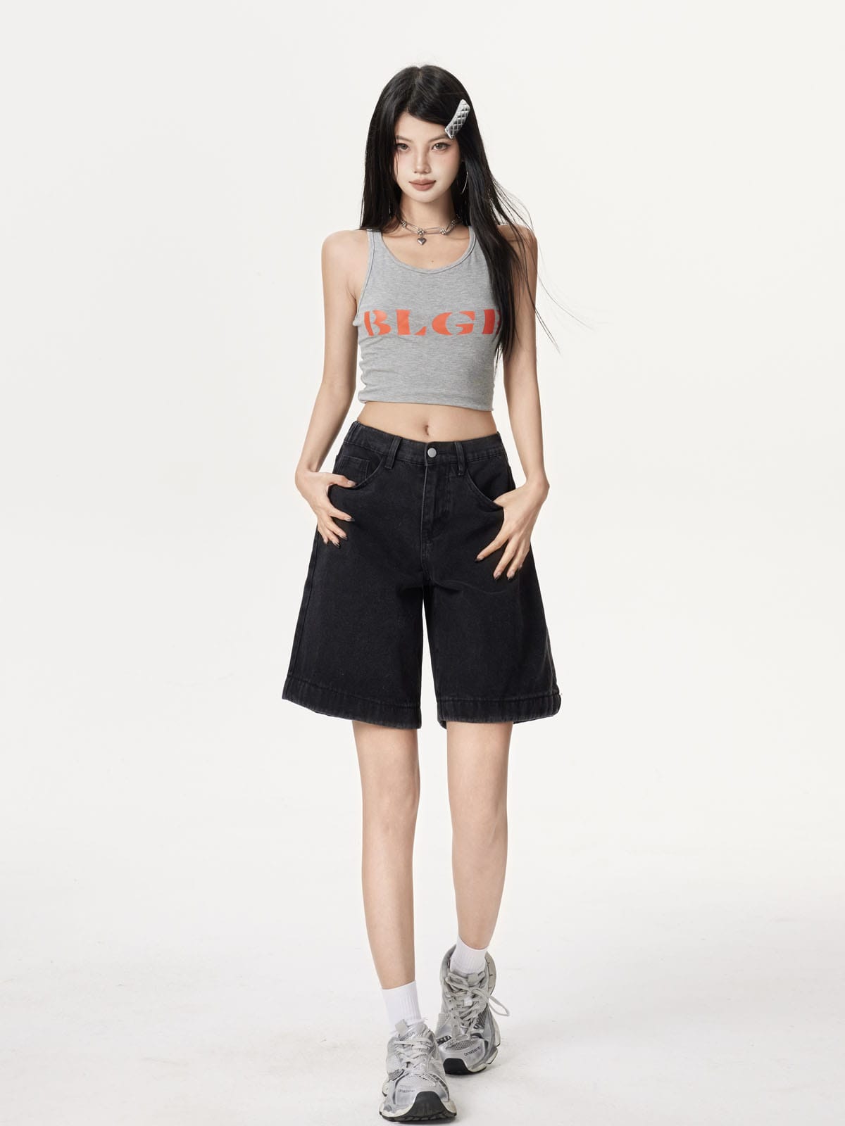 YEEYEEWang Denim Bermuda Shorts in Solid Black, Asian-fit cut, full-body front standing pose, hands resting on front pockets, grey tank top.
